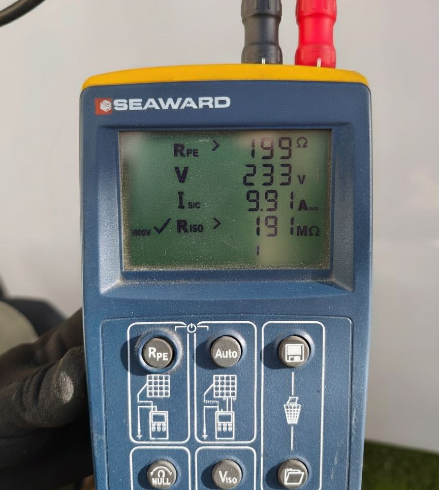 A technician using a Seaward PV150 to test a solar array.